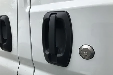Slam lock installation for a commercial van